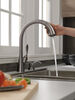 Single Handle Pull-Down Kitchen Faucet with Soap Dispenser and ShieldSpray&reg; Technology