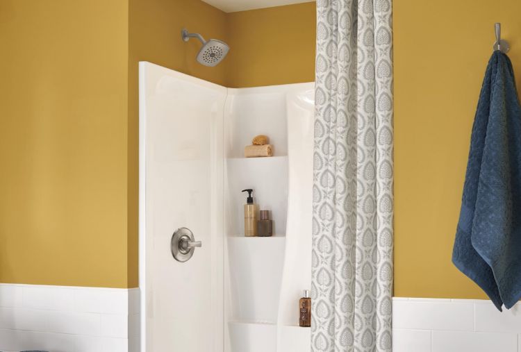 yellow bathroom with acrylic alcove shower