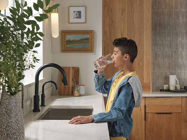 Why Water Quality Matters - Boy Drinking a glass of water