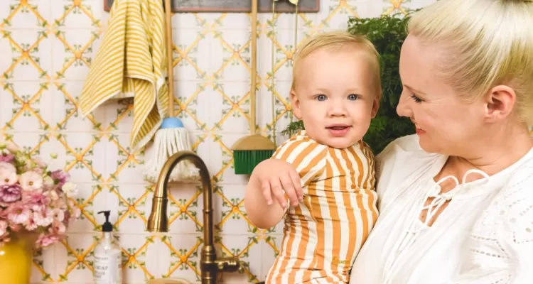 @houselarsbuilt and their chilld in their udpated laundry room