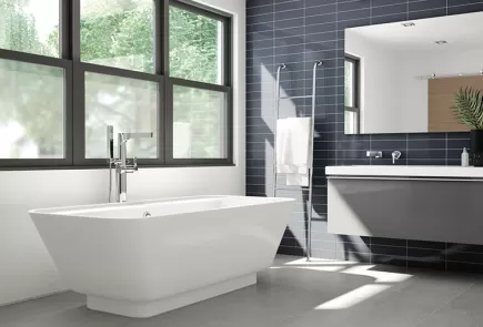 modern bathroom with light shining from a big window