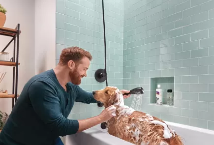 ManBathingDoginShower