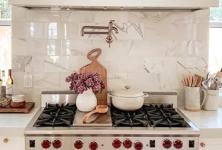 @mommingblog's inviting kitchen range with pot filler